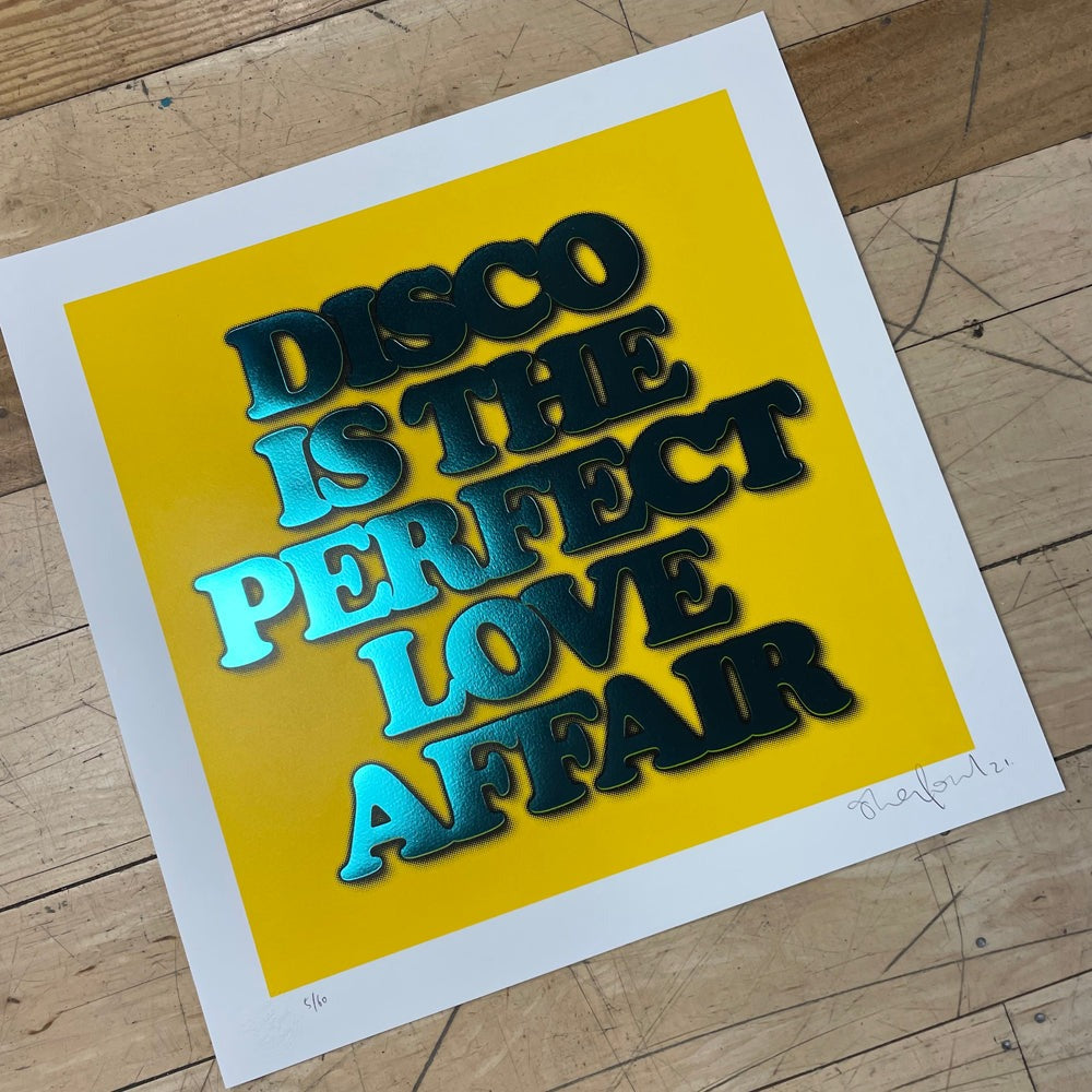 Yellow background with metallic-looking font saying 'Disco is the perfect love affair'